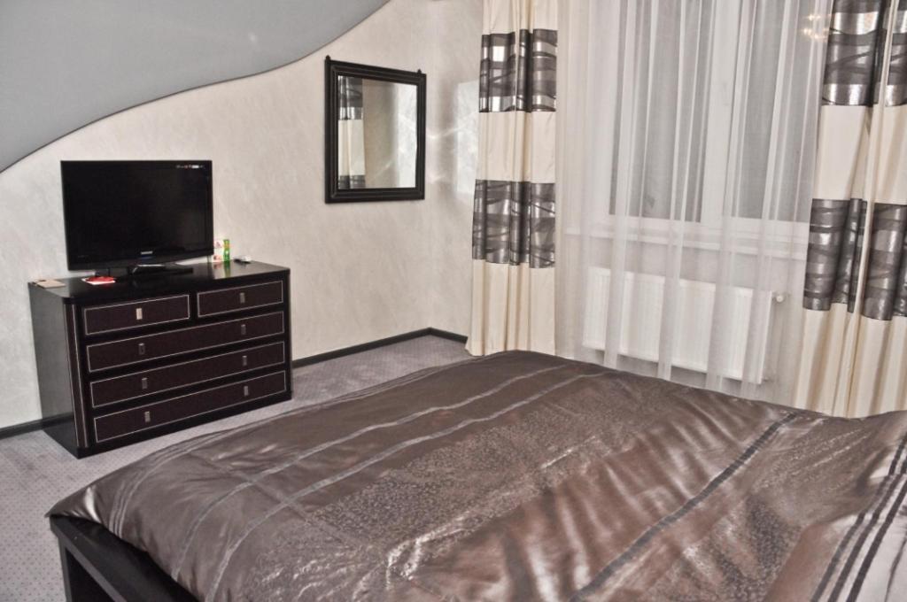 Coliseum Hotel Khmelʼnytsʼkyy Quarto foto